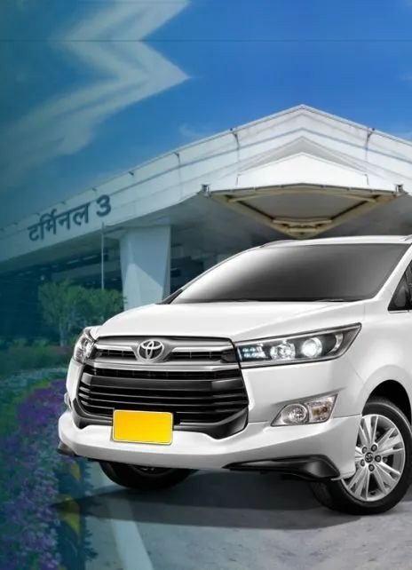 Innova Crysta cab waiting at a Delhi airport terminal